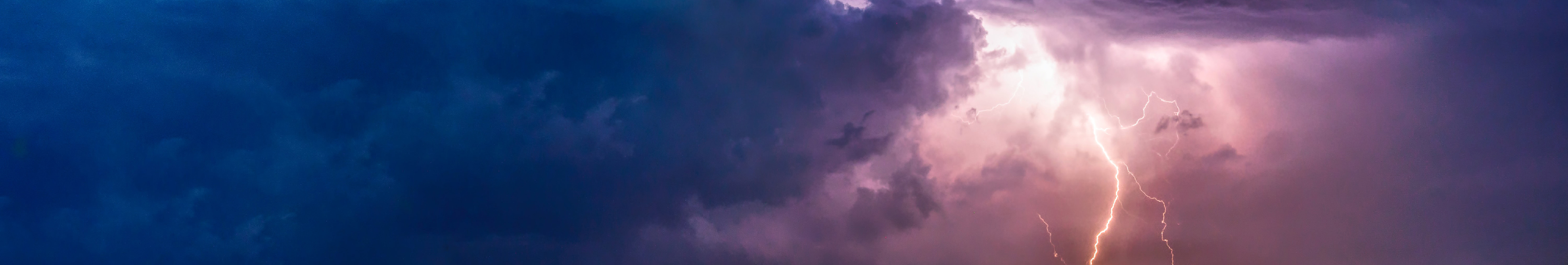 lightning bolt in a cloudy sky.